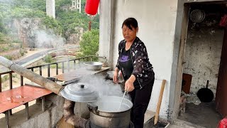 In the daily life in the countryside  my mother makes handmade noodles in a pan  which is the fire