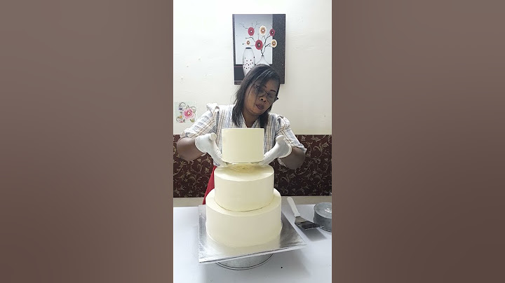 montage gâteau de mariage 3 niveaux chez pâtisserie la passion à Abidjan riviera faya