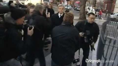 Chris Huhne arrives at court for charges of perverting the course of justice
