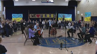'It's beautiful music': Lyric Opera musicians perform for students of war-torn Ukraine screenshot 2