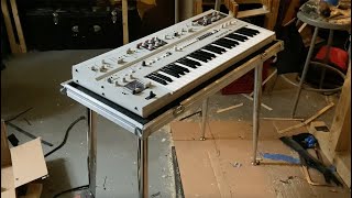 Celebrity building a synthesizer flight case / stand combo for the UDO Super 6 Profile