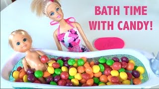 BATH time with CANDY! Emily surprises Barbie by putting something in her bath