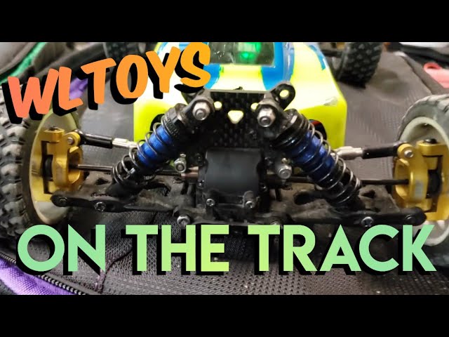 wltoys 144010 carbon fiber fully built on a clay track - YouTube