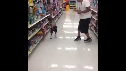 Little kid gets sprayed with silly string and goes crazy