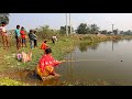 Fishing  beautiful lady are fishing with hooks in the village pond  catching fish