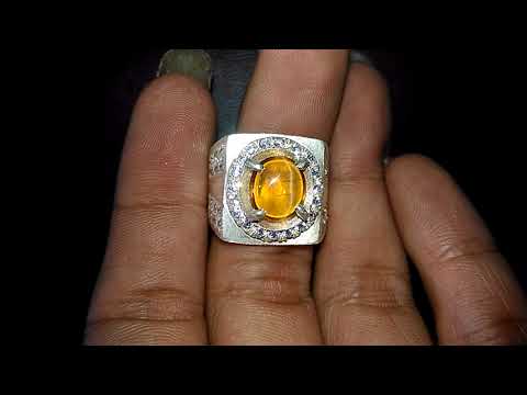 Batu Mulia Sillimanite Cat Eye Hijau Oval 10.20 carat. 