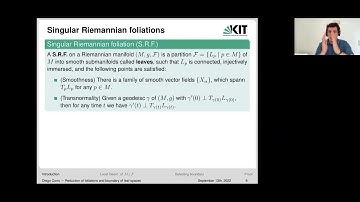 Reduction of singular Riemannian foliations and how to detect boundary of the leaf space