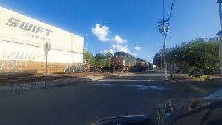 Short Northbound NS26C intermodal on track two, chased by Northbound CSX mixed manifest on track one