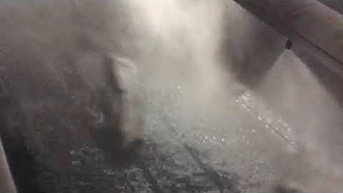 Dust suppression system for coal handling