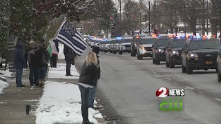 Thousands pay tribute to Detective Del Rio