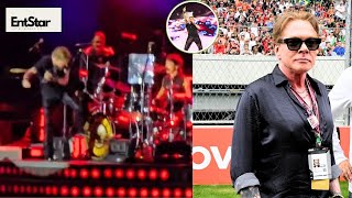 Axl Rose kicked and threw his microphone at Guns N' Roses new drummer equipment then left the stage