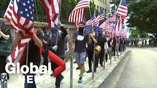 Thousands of hong kong protesters on sept. 8 sang the star spangled
banner and called u.s. president donald trump to "liberate"
chinese-ruled city, th...
