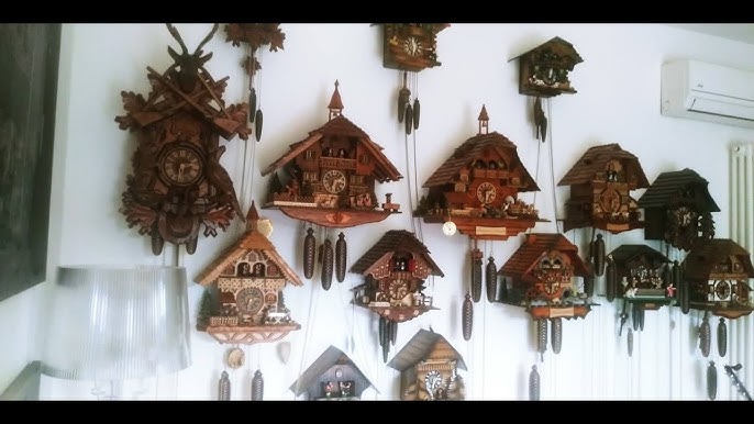 Istruzioni su come scartare, appendere l'orologio a cucù Foresta Nera.  Black Forest cuckoo clock 