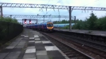 Transpennine Express and East Midlands trains passing Edge Hill Station