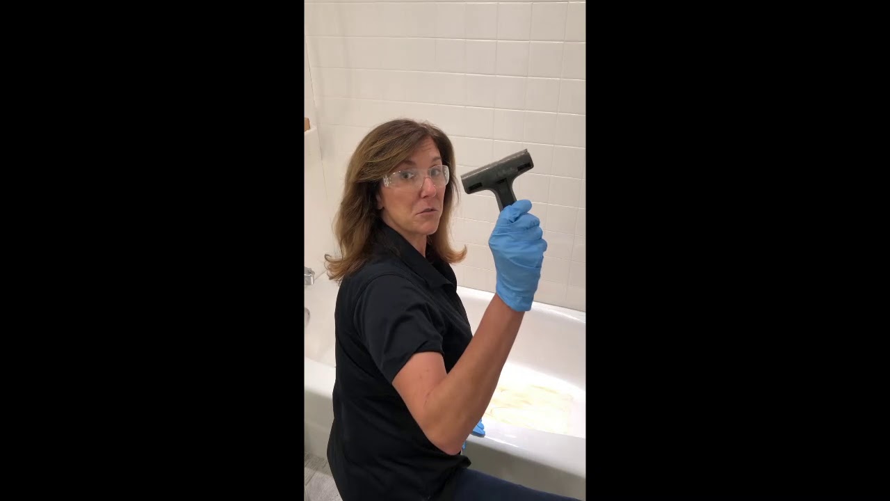 Cleaning the permanent slip-guard dots in my porcelain bathtub