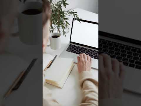 A man working on his Laptop.4k ultra high definition.