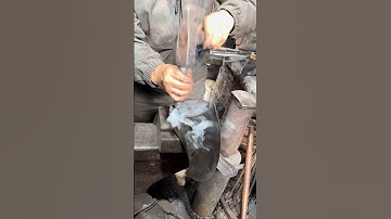 The process of attaching the handle to the axe