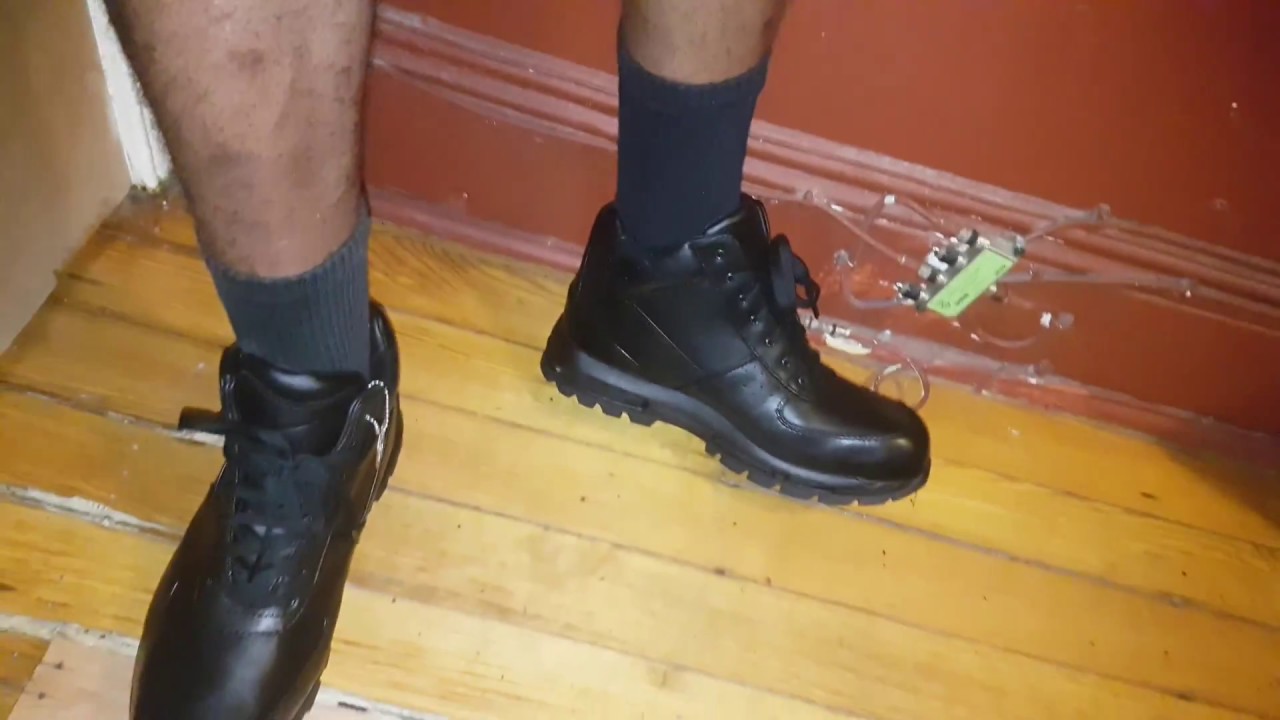 nike boots on feet