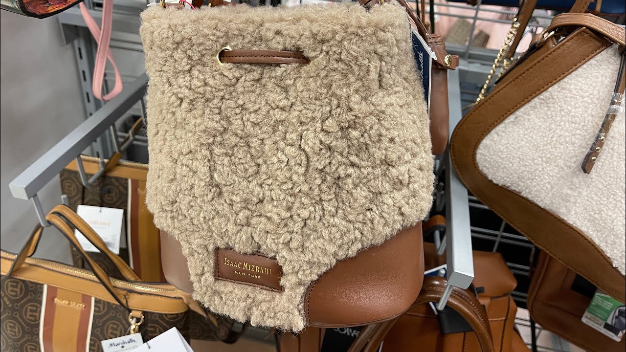 I found the Isaac Mizrahi Backpack at Marshall's .. Will be using as a