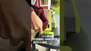 CLEANING SANDPAPER WITH A SHOE