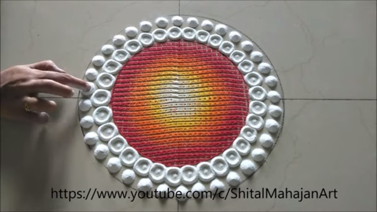 Big rangoli design using comb| Diwali special rangoli ...
