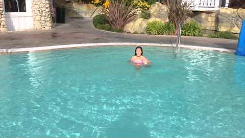 Melanie swimming in Madonna Inn