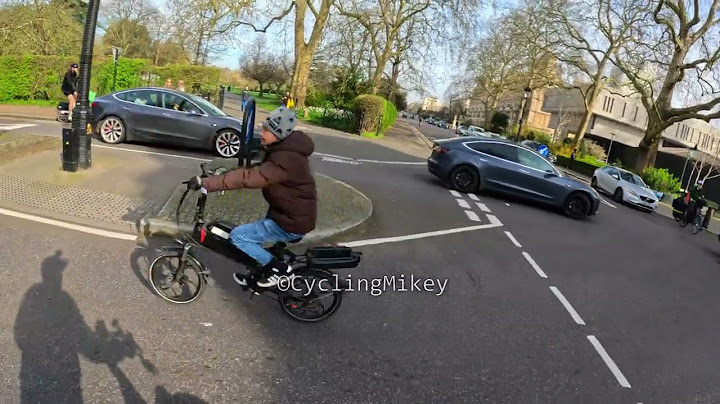 Tesla Driver Thinks He's Allowed To Use His Phone Whilst Driving - LD20XDL