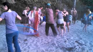 Drunk girl at full moon drum circle. Laguna beach.