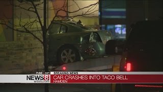 Car crashes into Taco Bell