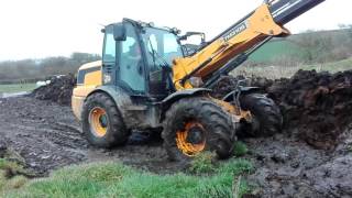 Pushing up the muck heap with JCB 310s