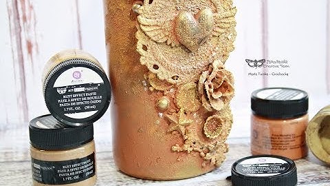 An altered bottle - Rust Effect Pastes by Finnabair