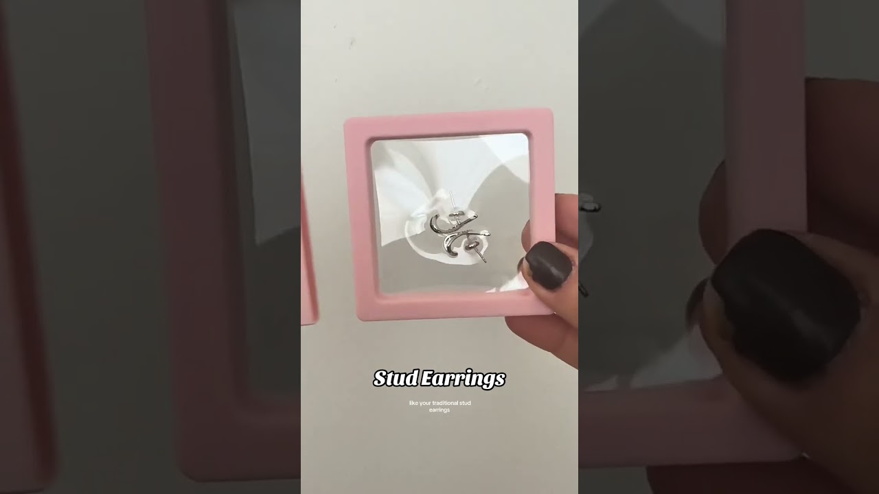 Elevate your look with these modern stud earrings! These stud earrings are the perfect way to add a