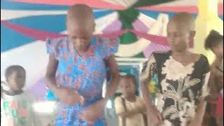 revival Gospel Church Sunday school dancing 'mlee mtoto' by Tanzania children