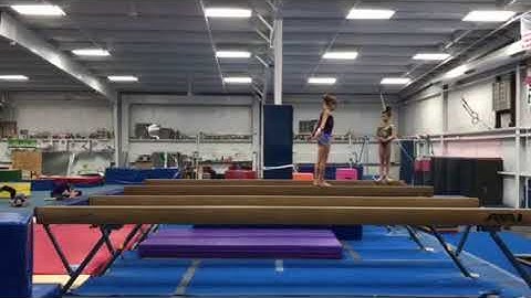 Alex Routsis - Class of 2023 - Beam Dismount