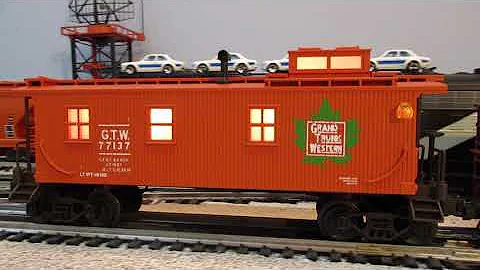 O scale Grand Trunk Western F3 diesel-electric locomotive, freight train, and matching wood caboose