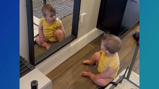 Eva looking in the mirror