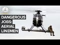 These Linemen Make Six Figures Dangling From Helicopters