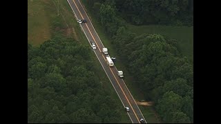 Raw: Police Hunt for Inmates After Guards Killed