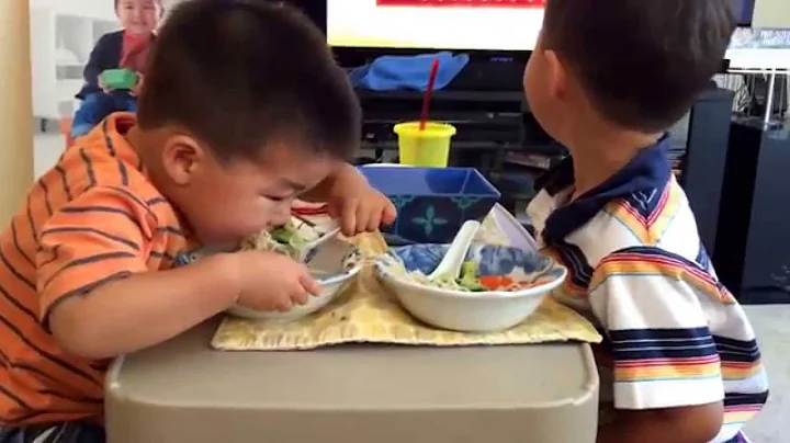 Tiny steals food from Little