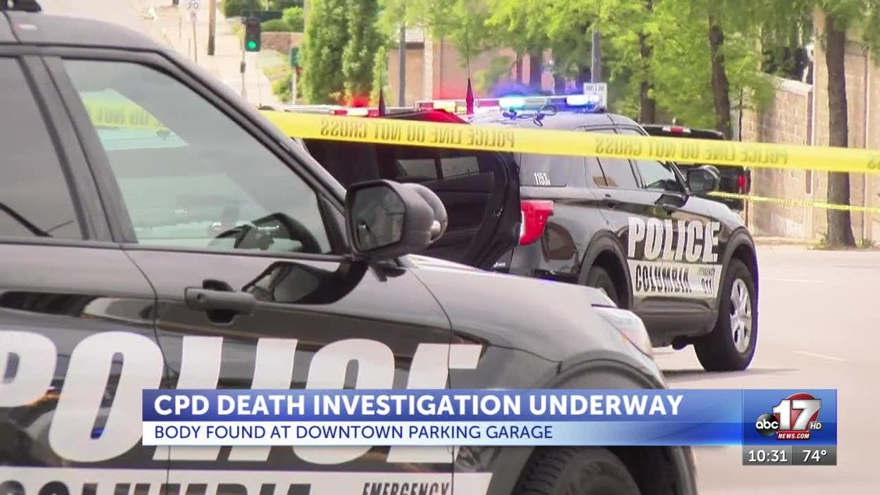 Death investigation underway after body found at downtown parking ...