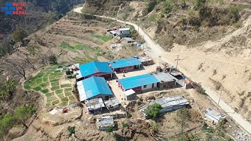 Rebuilding with interlocking Bricks - Majhigaun