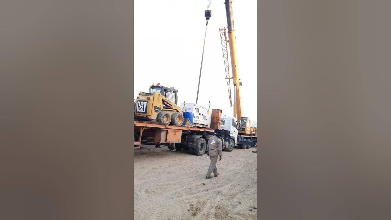 Hydraulic crane lifting Power generator and Bobcat YouTube