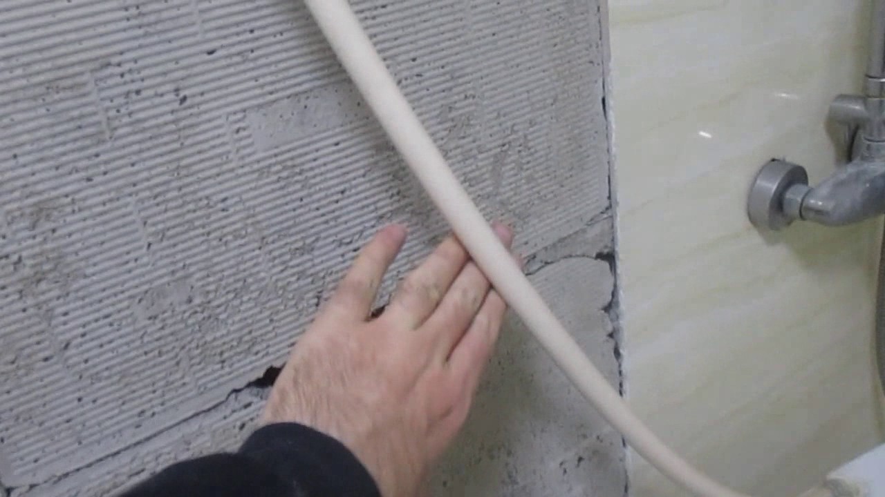 6 Tiles Unexpectedly Fell Off My Bathroom Wall to China