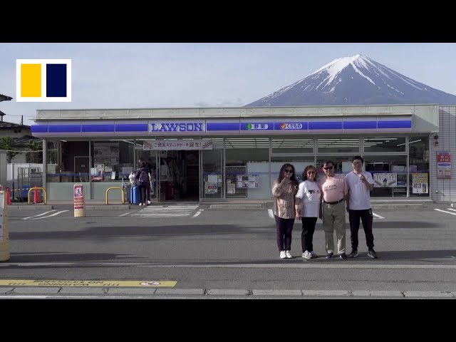 Japanese town erects barrier blocking iconic view of Mount Fuji class=