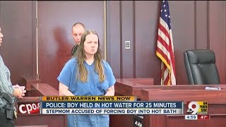 Stepmom accused of forcing boy into hot bath appears in court