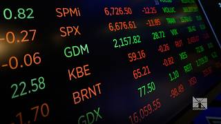 Apple leads Wall Street toward more records Friday as oil prices drop