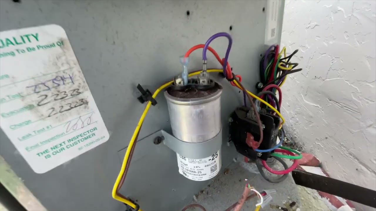 How to find the capacitor on my Ruud AC - YouTube
