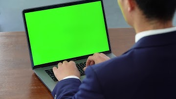 4k business office men Green Screen Laptop mock up display notebook video keying
