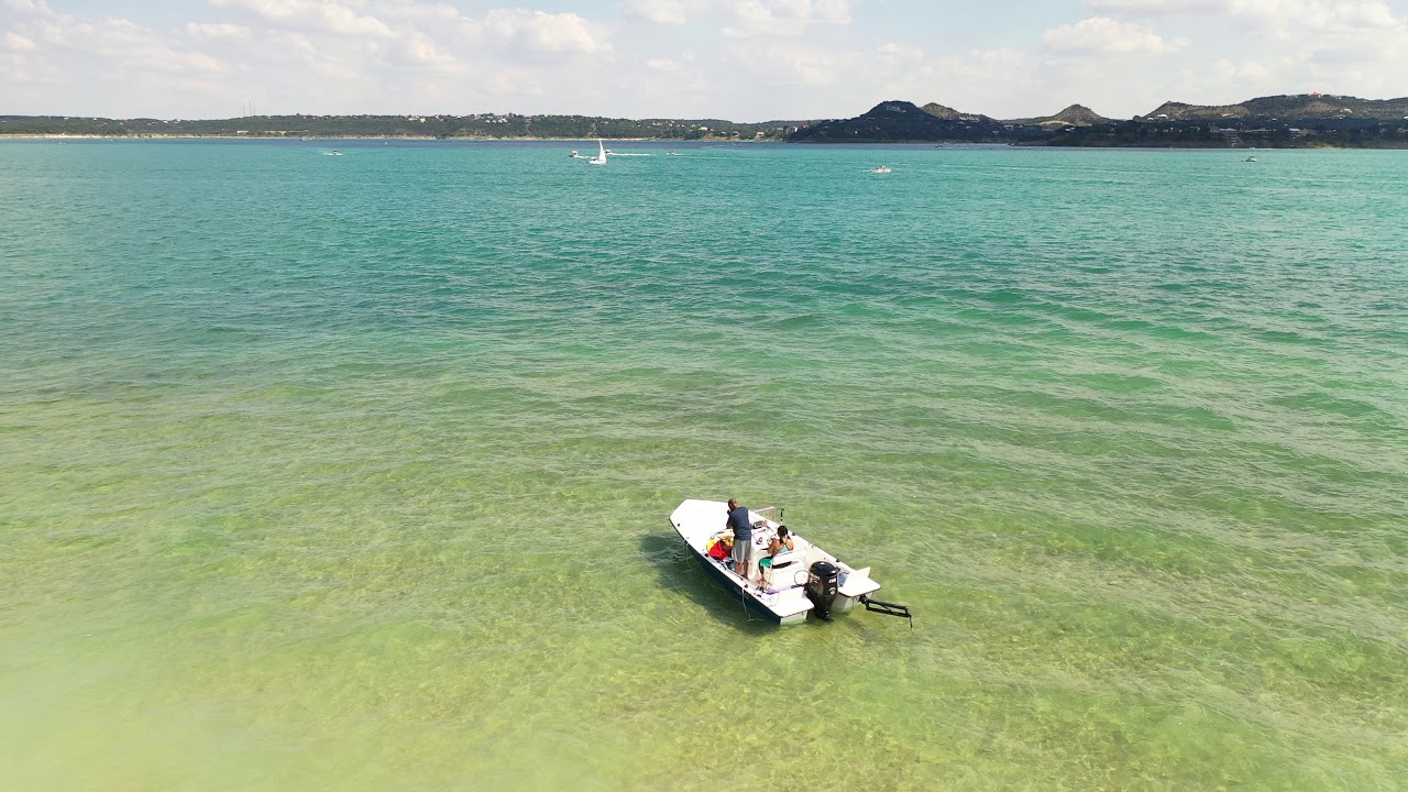 Couple in a boat on Canyon Lake, Texas YouTube