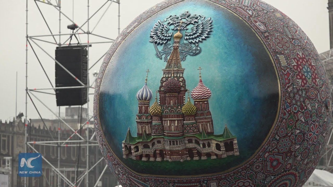 Mexico City residents gather in main square to watch World Cup opening match